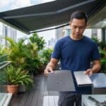 Material comparison between solution-dyed canvas, insulated composite panels, and polycarbonate awning roofing in Singapore